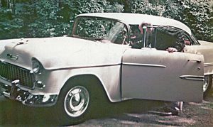 William M. Raymond, Jr. leans into the 1955 Chevy Hardtop Convertible with last minute driving directions for his daughter, Faith. Soon, she would be driving this vehicle on "turtle back" country roads to the wilds of New Canaan, CT.