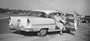Marie C. Raymond getting out of the family's new 1955 Chevy Hardtop Convertible at Cummings Park Beach, Stamford, CT.